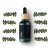 Black glass bottle with wooden stopper and dropper containing BIO myrtle essential oil, surrounded by green myrtle branches on white background